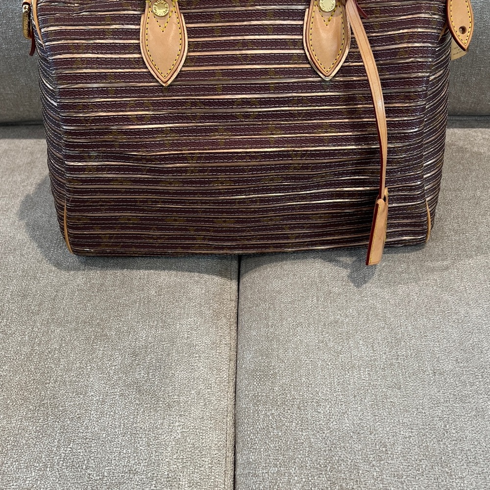 LOUIS VUITTON Monogram Eden Speedy in Peach